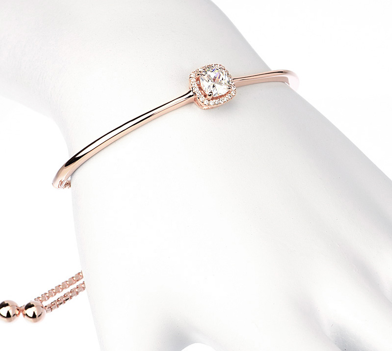 Pulsera linea premium, esclava con piedra central, ajustable, rosada