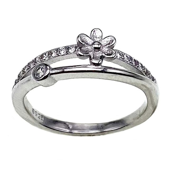 ANILLO DOBLE MEDIO SIN FIN CON FLOR Y SUSANITO
