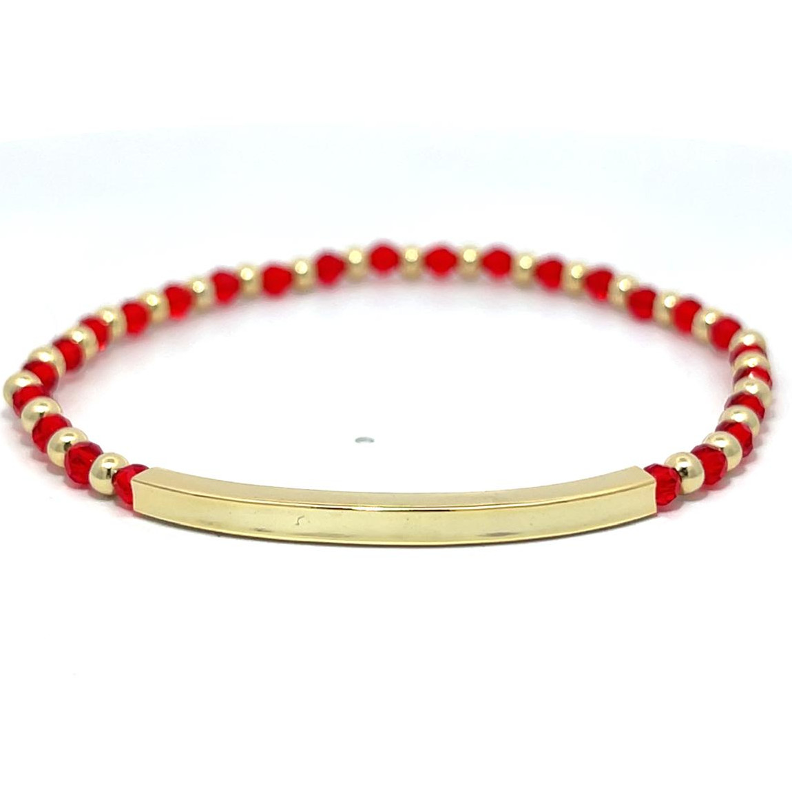 PULSERA DORADO IDENTIDAD BOLITAS Y CRISTAL ROJO ELASTIZADA